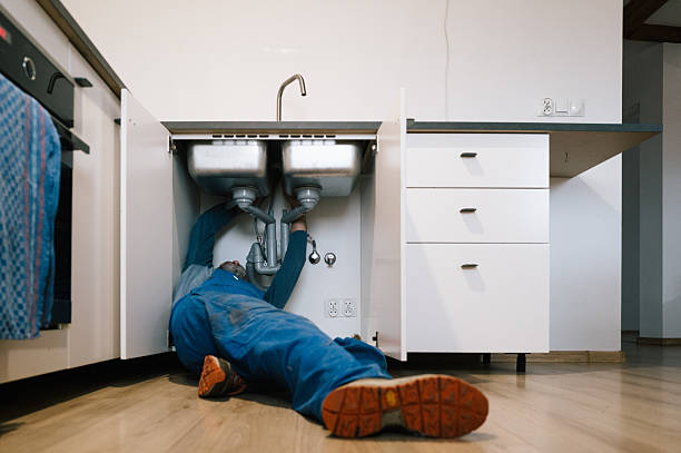 Professional Emergency Plumber technician working in Harrison, MI